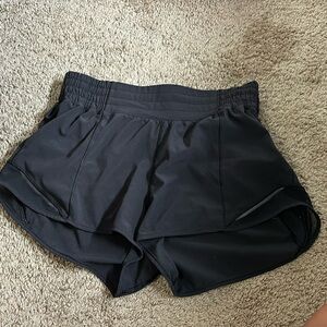 Black lululemon size 6 hotty hot low waisted 2.5” shorts